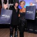 DJ Ashba and actress Nicky Whelan with Silver Jeans Co. d...