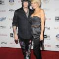 DJ Ashba and actress Nicky Whelan with Silver Jeans Co. d...